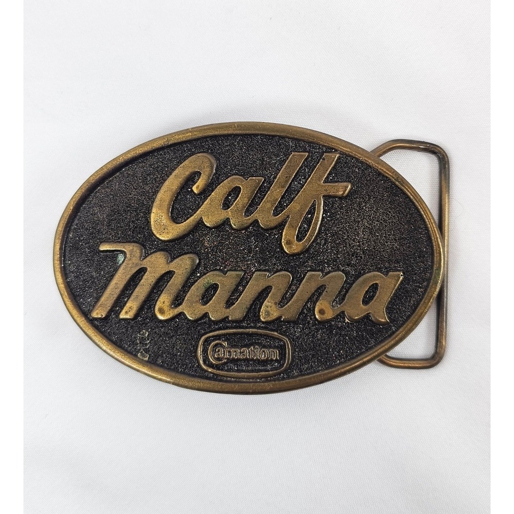 Vintage 1977 Carnation Calf Manna Solid Brass Belt Buckle Award Design